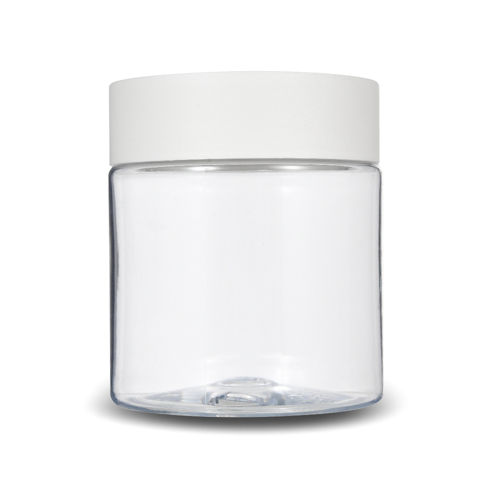 Pot de fleurs de cannabis en plastique transparent avec couvercle blanc pour l'emballage de l'herbe, des bourgeons de CBD et des gommes comestibles