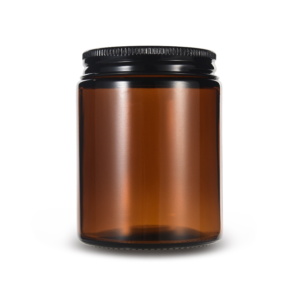 Amber glass weed jar with ribbed black screw cap for cannabis flower and herb storage